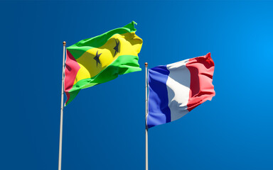 Beautiful national state flags of France and Sao Tome and Príncipe together at the sky background. 3D artwork concept.