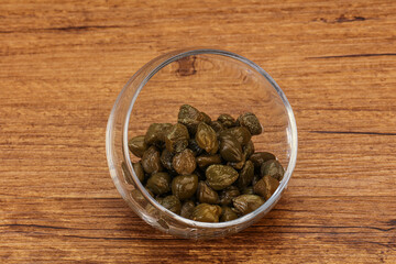Tasty capers in the bowl