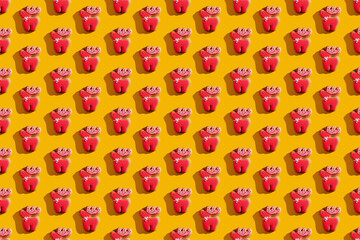 Red deer seamless pattern. Orange art background. Fun decorative design wallpaper for children. Cute creative abstract animal figure ornament isolated on bright yellow.
