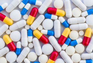 background of various pills close up