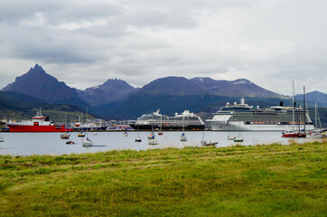 Modern cruise ship, cruiseship liner or expedition vessel ship in port of Ushuaia, Argentina with...