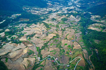 Aerial view of rice terraces in mountainous region of Y Ty, Vietnam