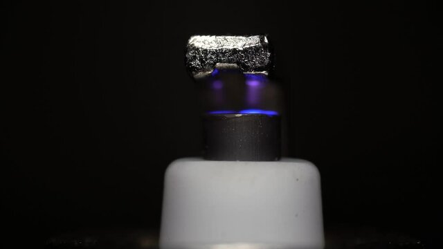 Macro view of working new spark plug