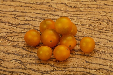 Fresh yellow cherry tomato heap