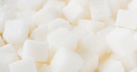 Fototapeta na wymiar Sugar cube texture background sweet food ingredient, studio shot health high blood risk of diabetes, and calorie intake concept