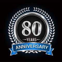 Birthday celebration logo 80th years with wreath, laurel, blue ribbon and silver ring.