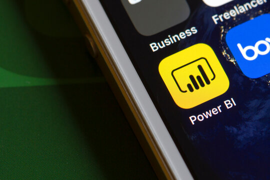 Portland, OR, USA - Apr 22, 2020: Microsoft Power BI Mobile App Icon Is Seen On A Smartphone. The Business Analytics App Provides Interactive Data Visualization And Business Intelligence Capabilities.