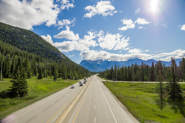 Highway road in mountain. Summer time.  Banff, Alberta, Canada