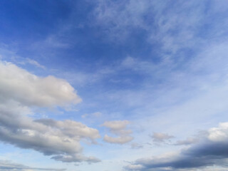 Beautiful white fluffy cloudy sky background,