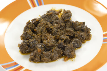 jugged snails prepared and served on a plate