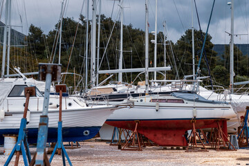 Yachts parked at the marina quayside in the off-season