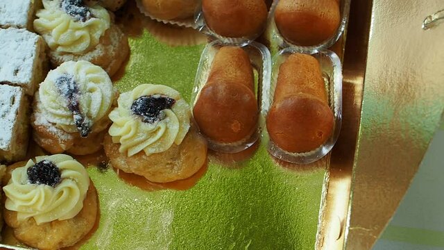 Lunch at home with the family. Dessert time comes with several small pastries typical of the Italian tradition.