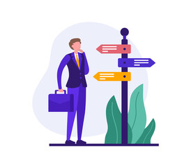 Thoughtful male entrepreneur choosing route on crossroad