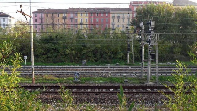 Europe, Italy , Milan november 2020 - Navigli area - The Porta Genova trein railway and the colorful houses that overlook the canals of the Naviglio