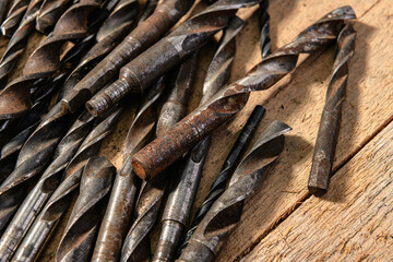 old vintage hand tools - set of drills on a wooden background