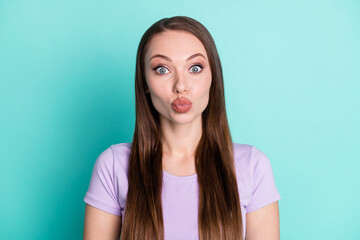 Photo portrait of playful funky girl sending air kiss with plump pouted lips staring isolated on...