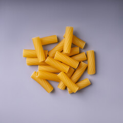 tortiglioni pasta on clean background close up, isolated