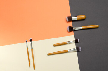 Set of professional brush for make-up on the colorful background.Empty space