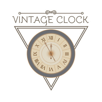 Antique clock with elegant frame. Old fashioned design element. Vintage watch.