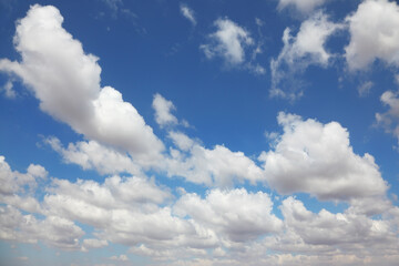 Naklejka na ściany i meble The clouds in a blue sky