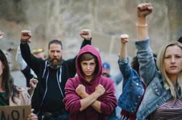Group of people activists protesting on streets, women march and demonstration concept.