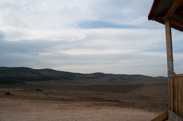 Baikal lake fresh water
flora shore reserve Russia Irkutsk park island Sky clouds clear Olkhon rocks trees embankments sand bay lagoon stones mountains hills horizon line panorama autumn water waves 