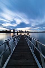 Fototapeta na wymiar Cloudy sky over a jetty at Parramatta River, Sydney, Australia.