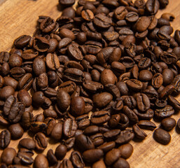 roasted coffee beans and a cup of coffee