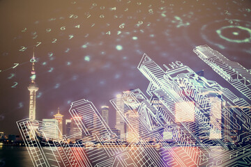 Double exposure of buildings hologram over cityscape background. Concept of smart city.