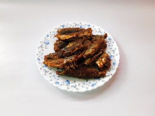 selective focus on delicious dish(Fish fries)in a bowl isolated on white background