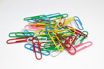colorful paperclips on a white background