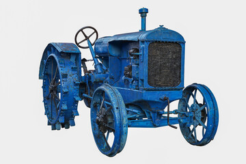 Fototapeta na wymiar Vintage agricultural tractor in blue