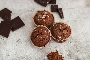 
Chocolate muffins with powdered sugar