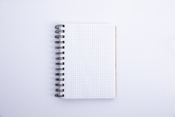 opened empty new notepad isolated on white background, close view . High quality photo