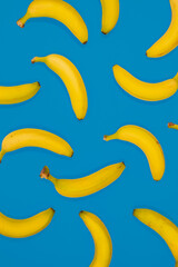 Bananas on blue paper