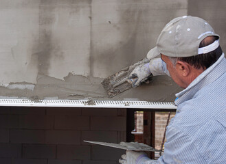 Construction site - Installing external insulation Facade therm