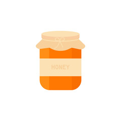 This is a glass jar of honey isolated on a white background.