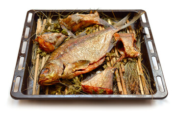 Long-cooked fish. Baked in a Russian oven on straw