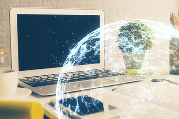 Computer on desktop with social network hologram. Multi exposure. Concept of international people...