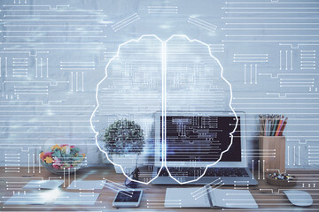 Double exposure of work space with computer and human brain drawing hologram. Brainstorm concept.