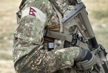 Soldier with assault rifle and flag of Nepal on military uniform. Collage.