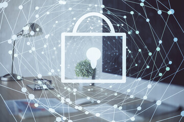 Double exposure of desktop with computer and lock icon hologram. Concept of data safety.