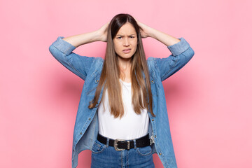 young pretty woman feeling frustrated and annoyed, sick and tired of failure, fed-up with dull,...