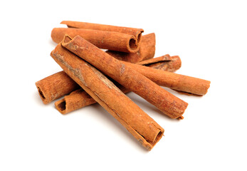 cinnamon sticks isolated on white
