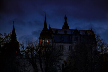 Obraz premium Beautiful old historic castle Romrod in Hessen, Germany. View on Schloss Romrod by night.
