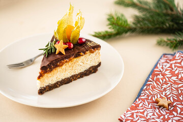 Christmas cheesecake with nuts on a Christmas background.