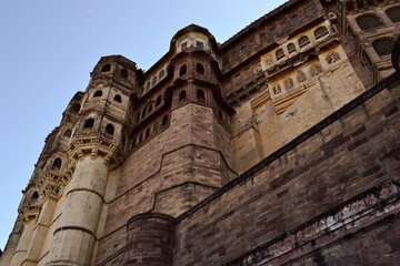 Fototapeta na wymiar View of Mehrangarh Fort (Mehran) from low angle. Largest fort palace in India and popular travel destination. Jodhpur, Rajasthan, India.