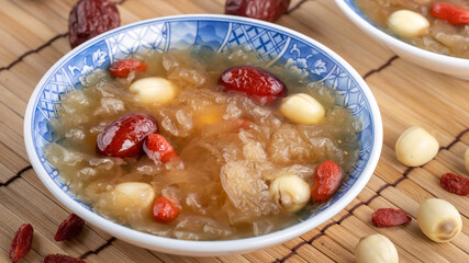Close up of sweet snow white fungus soup with lotus seed, Chinese red dates and wolfberry.