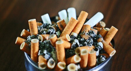 ashtray full of cigarettes butt