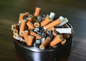 ashtray full of cigarettes